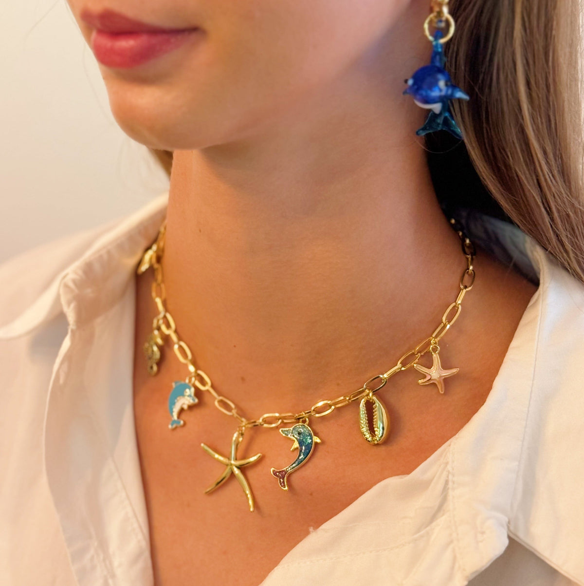 Women's Ocean Play Charm Necklace | Dolphin, Starfish, Seahorse & Shell Design